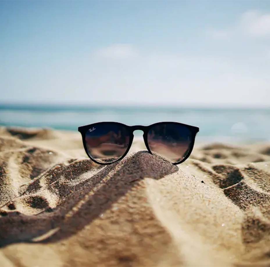 Sunglasses and Sand.