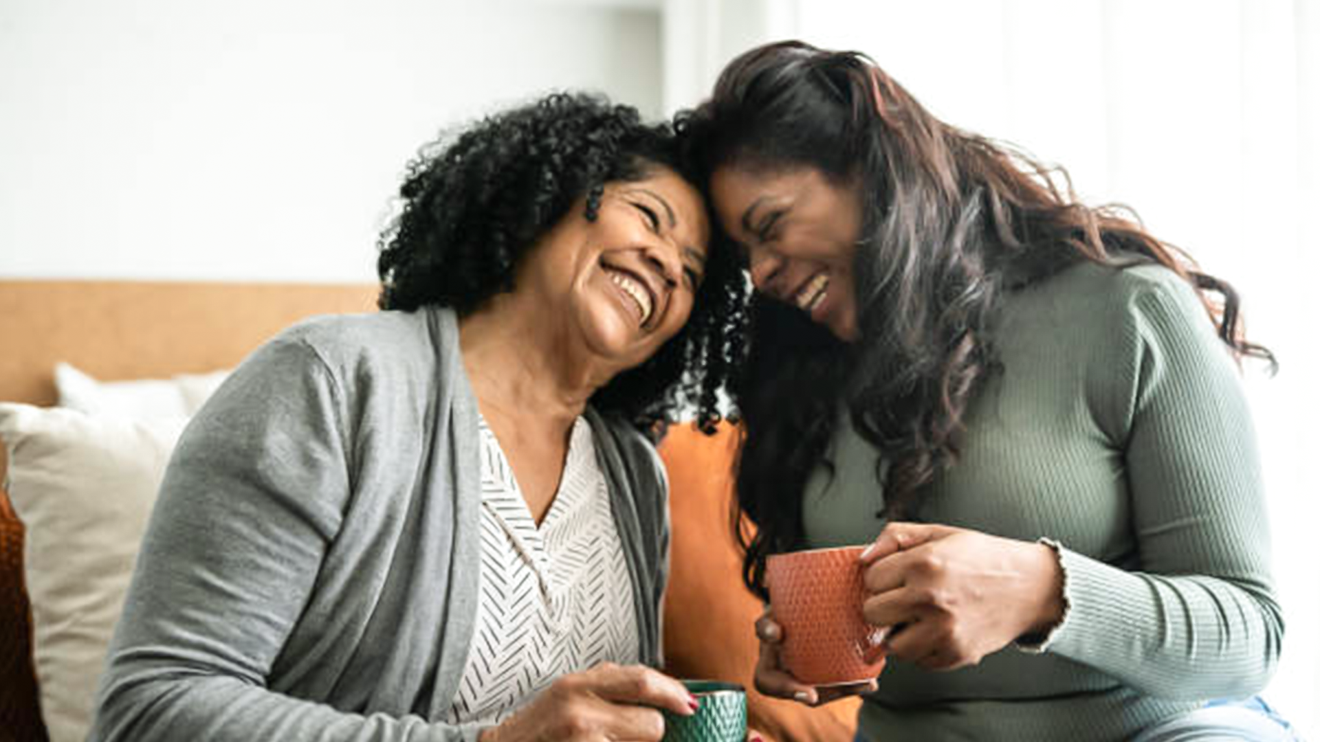 An image of two friends having tea.